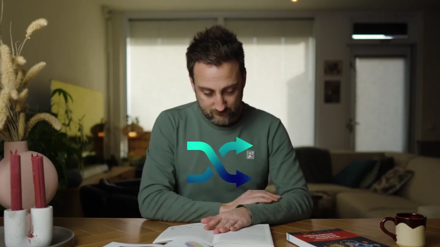 Scène uit de CHE-campagne met de student aan een tafel thuis